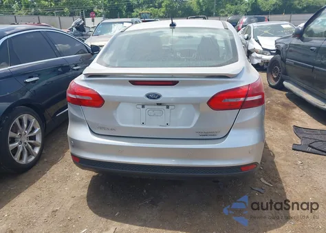 2016 Ford Focus Titanium из США, поврежденный, VIN 1FADP3J23GL301102